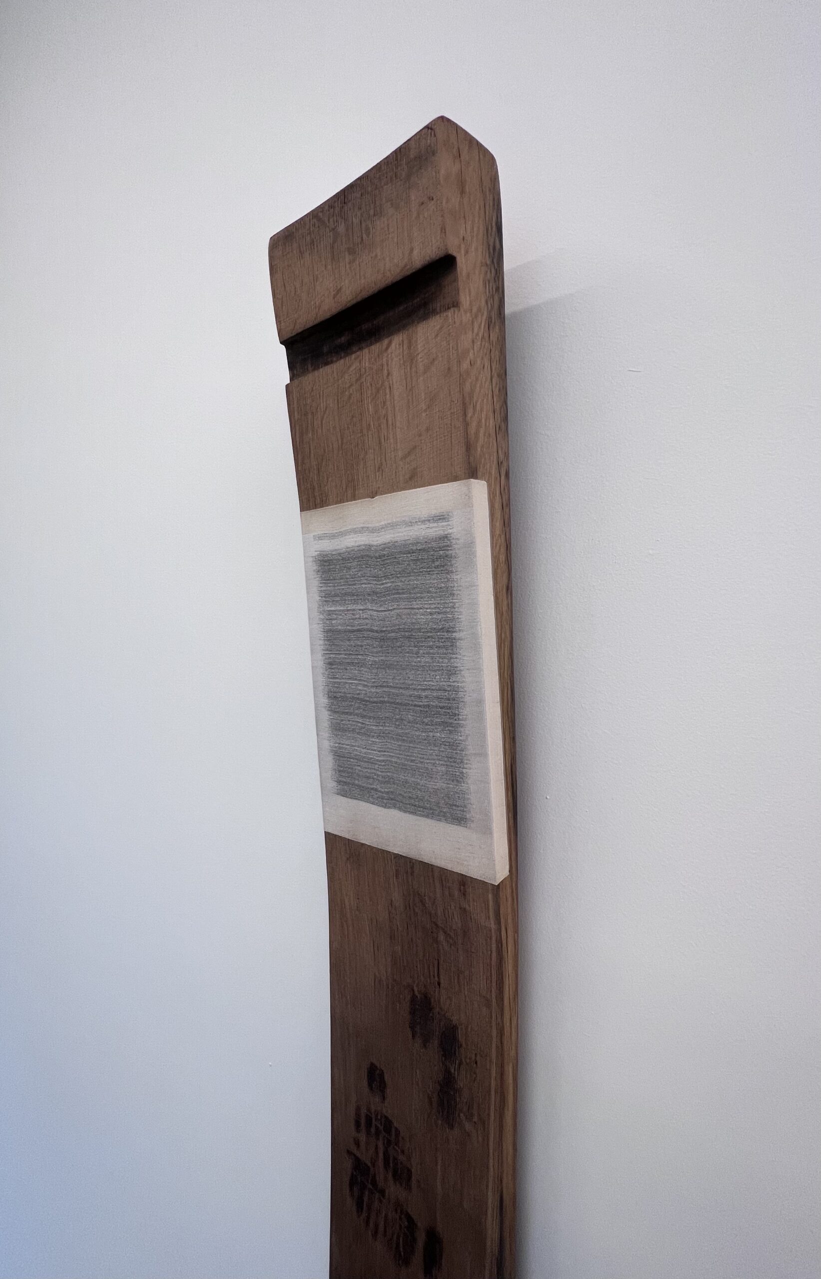 Denmark - dead letters, horizontally cut book embedded in wine wood